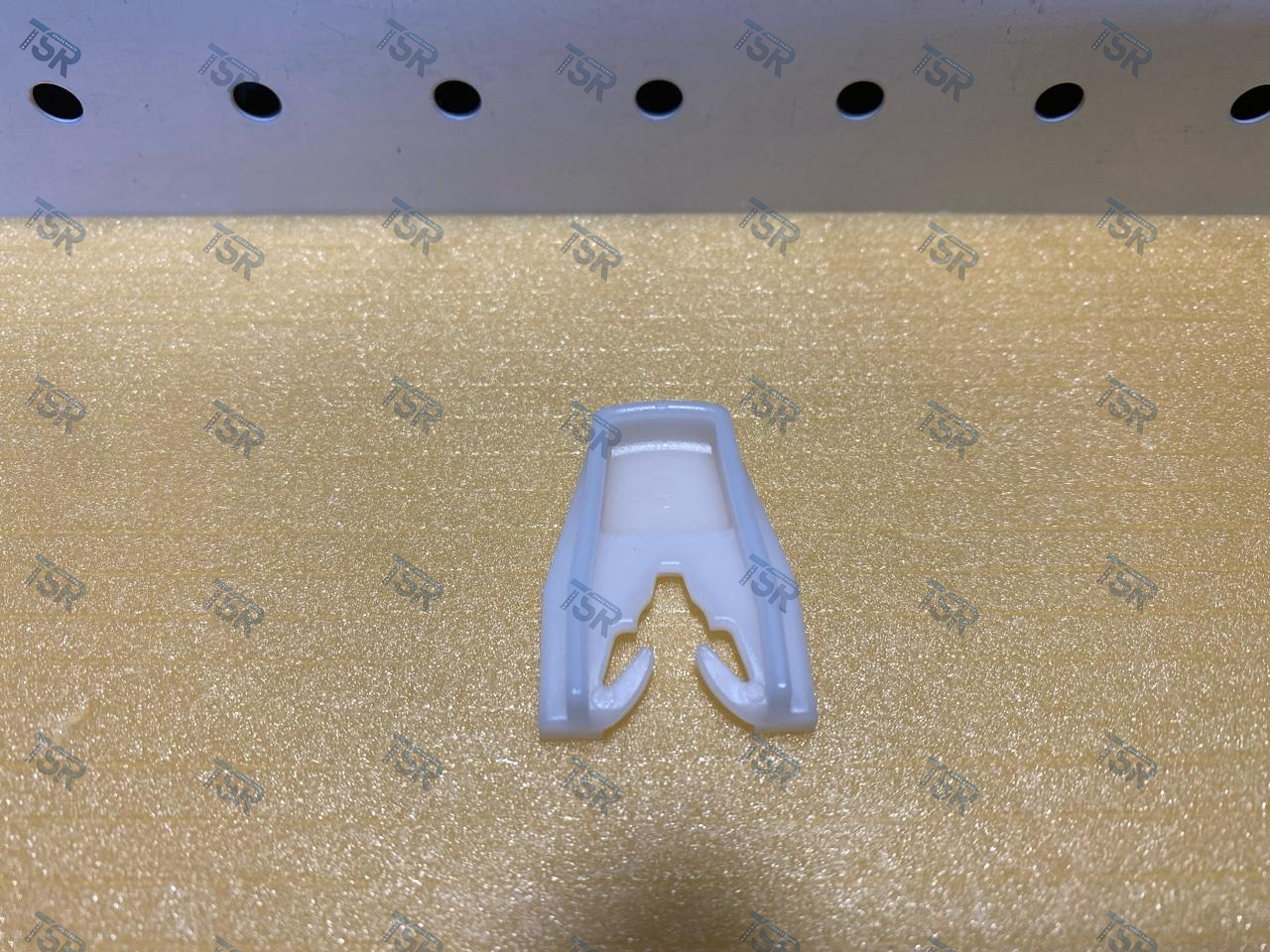 Фиксатор стеклоподъемника