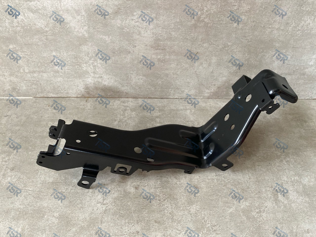 Кронштейн фары правый