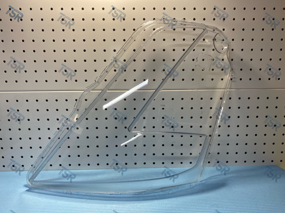 Стекло фары левой