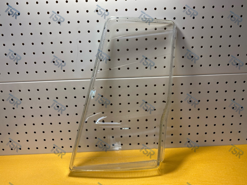 Стекло фары левое