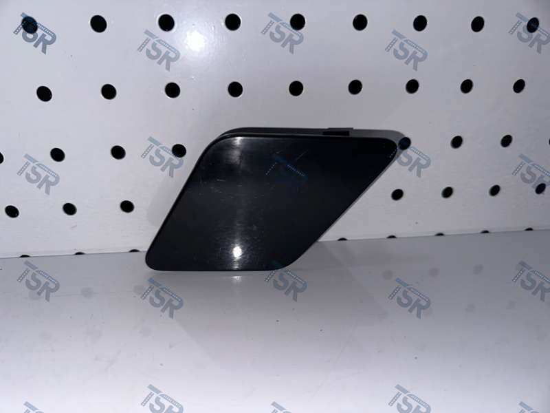 Заглушка облицовки фары левая