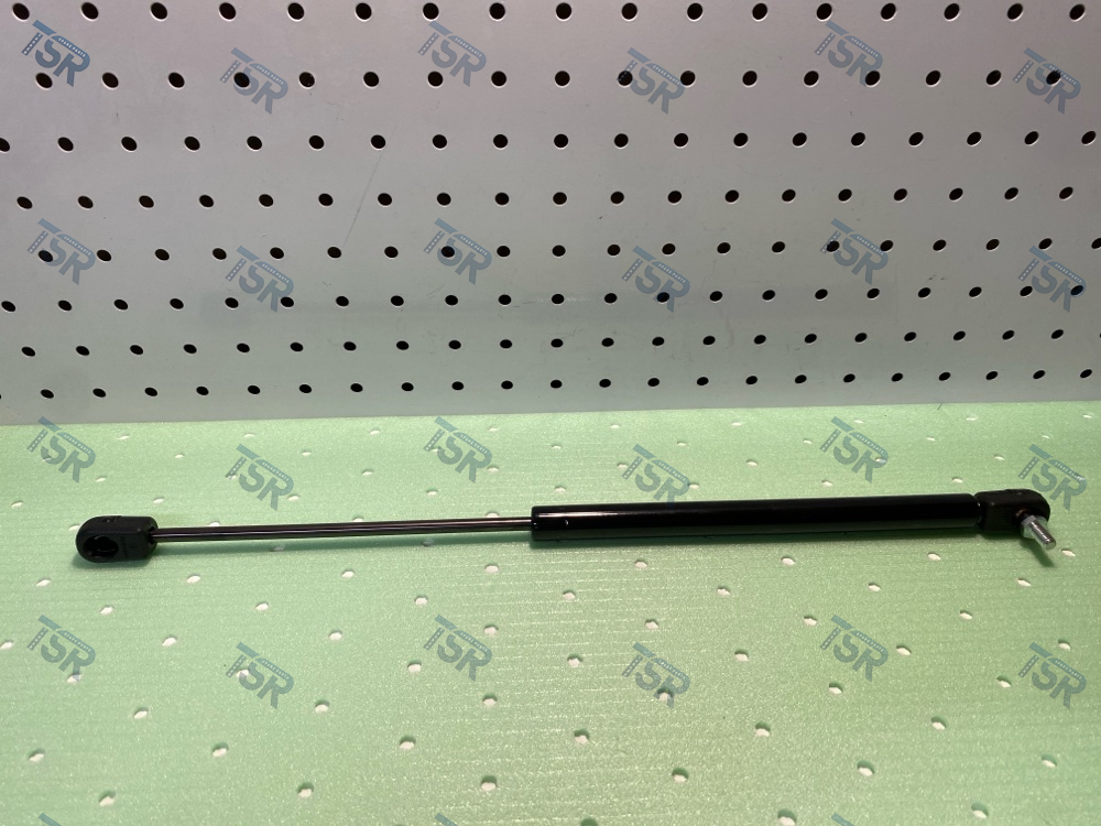 Амортизатор вещевого ящика кабины