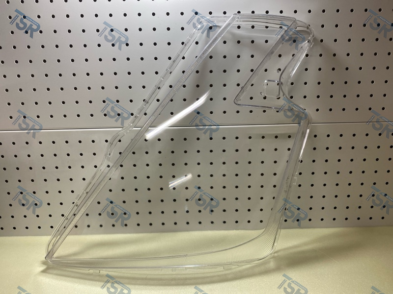 Стекло фары левой