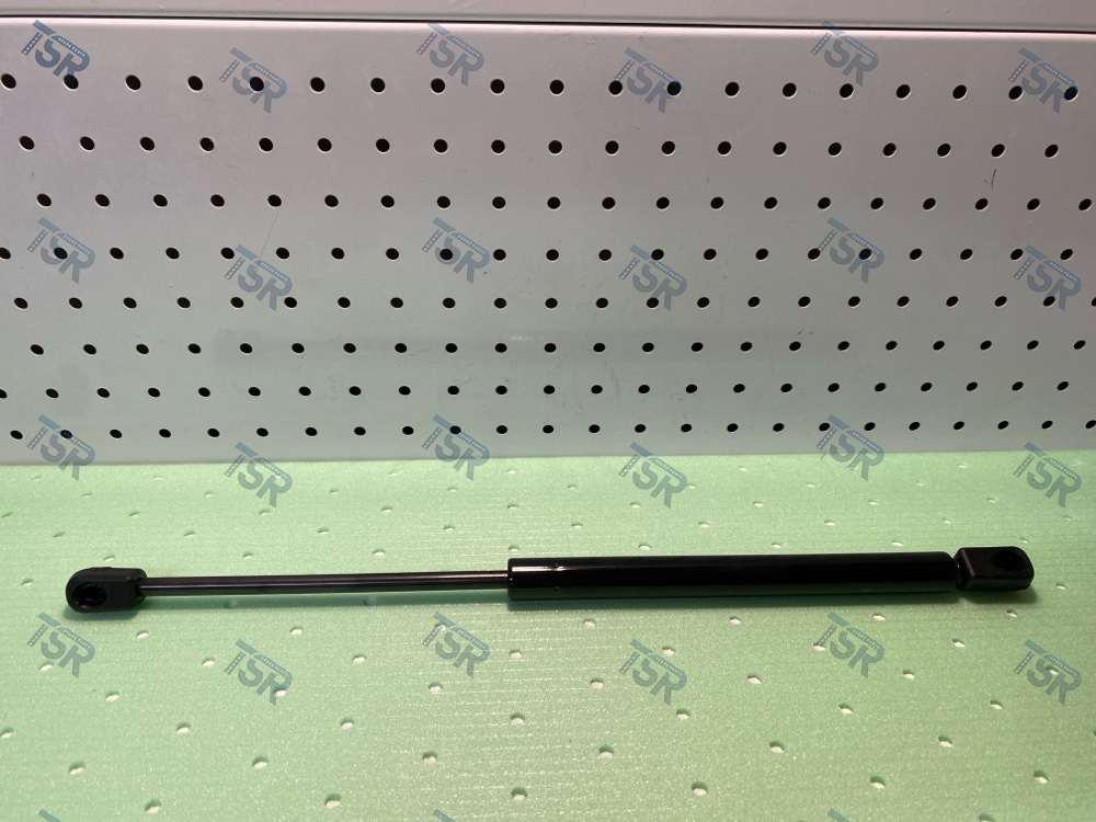 Амортизатор бокового ящика кабины