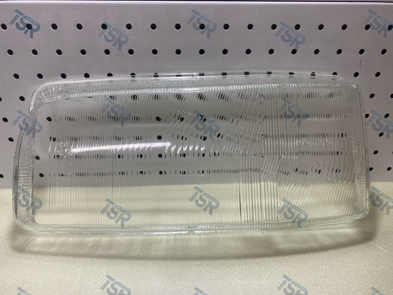 Стекло фары левое