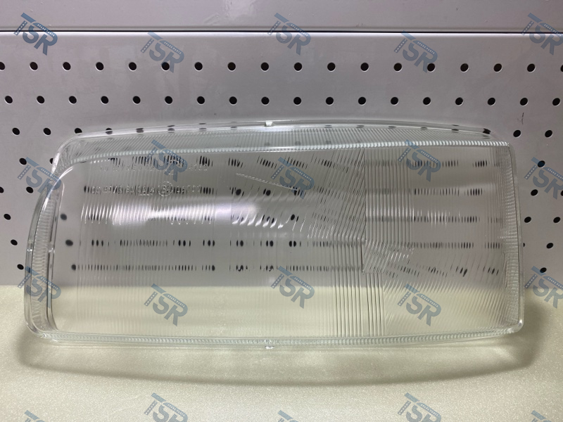 Стекло фары левое