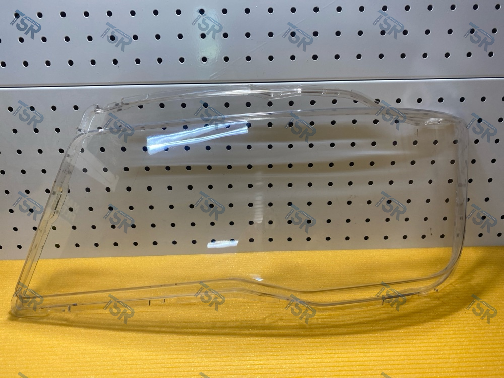 Стекло фары левое