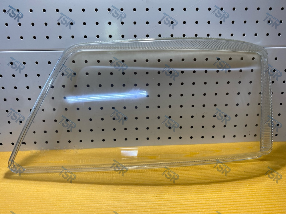 Стекло фары левое