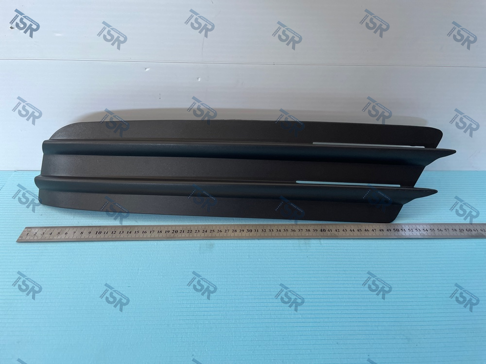 Накладка противотуманной фары, левая MAN TGX (длинная)