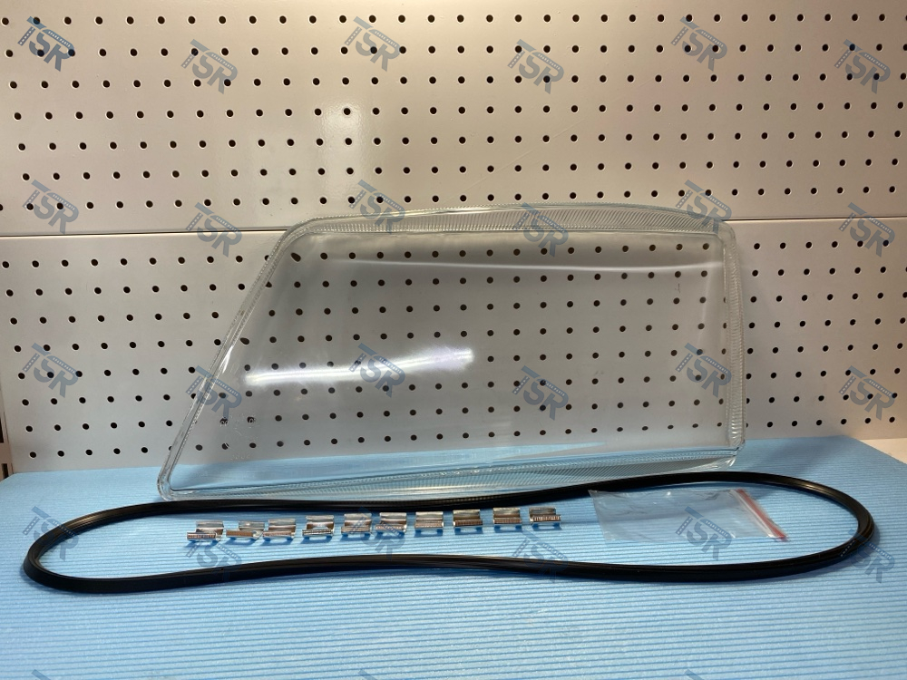 Стекло фары левое