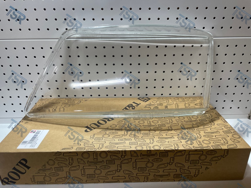 Стекло фары левое