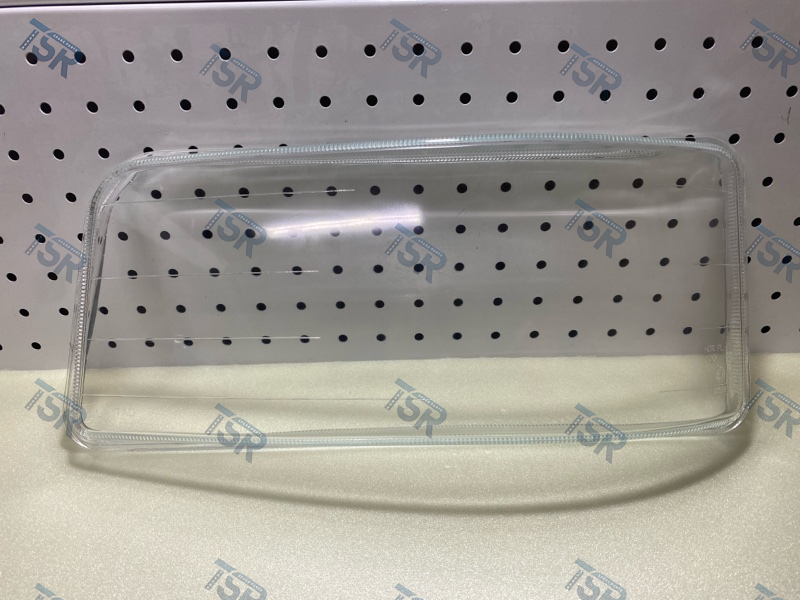 Стекло фары левое