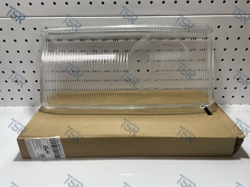 Стекло фары левое