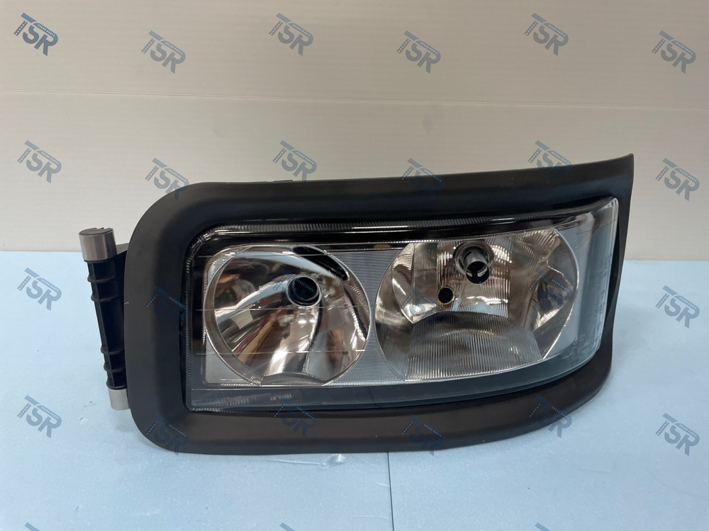 Фара головного света левая