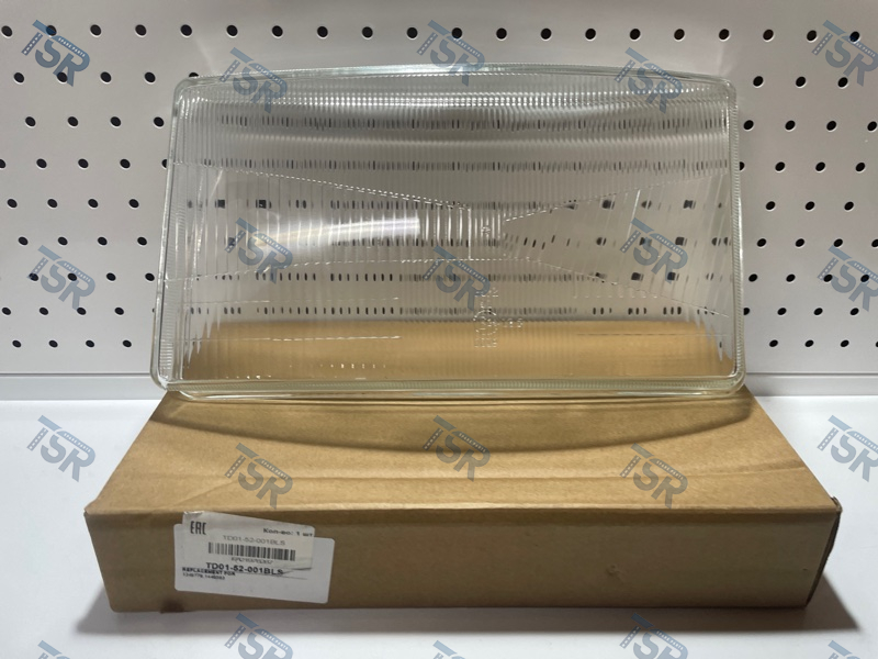 Стекло фары левое