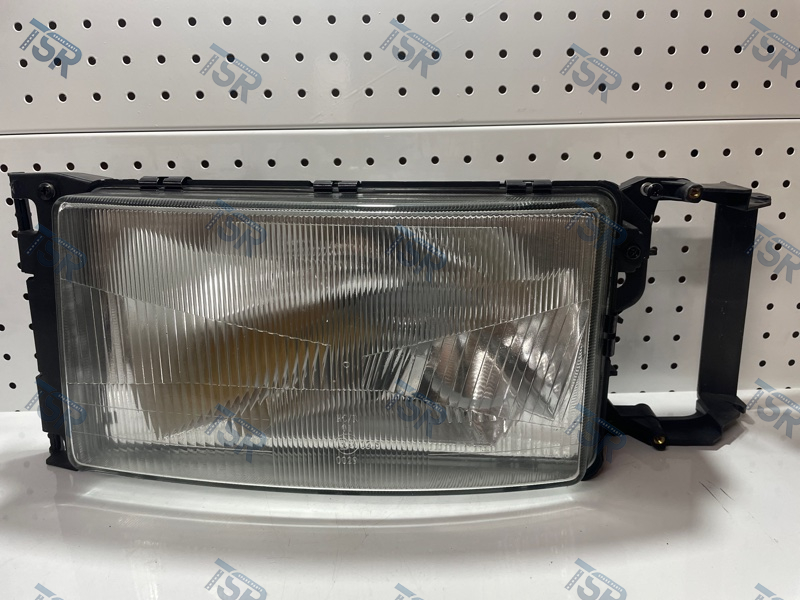 Фара головного света левая