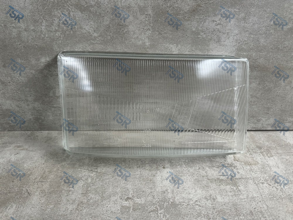 Стекло фары правое