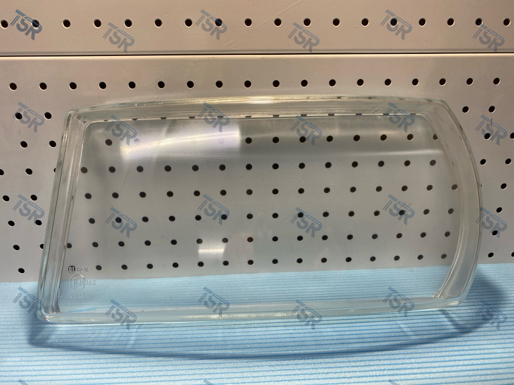 Стекло фары левое