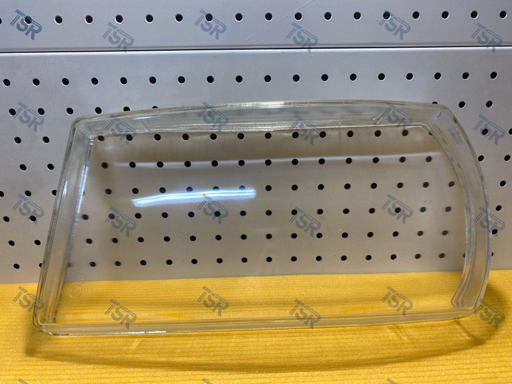 Стекло фары левое