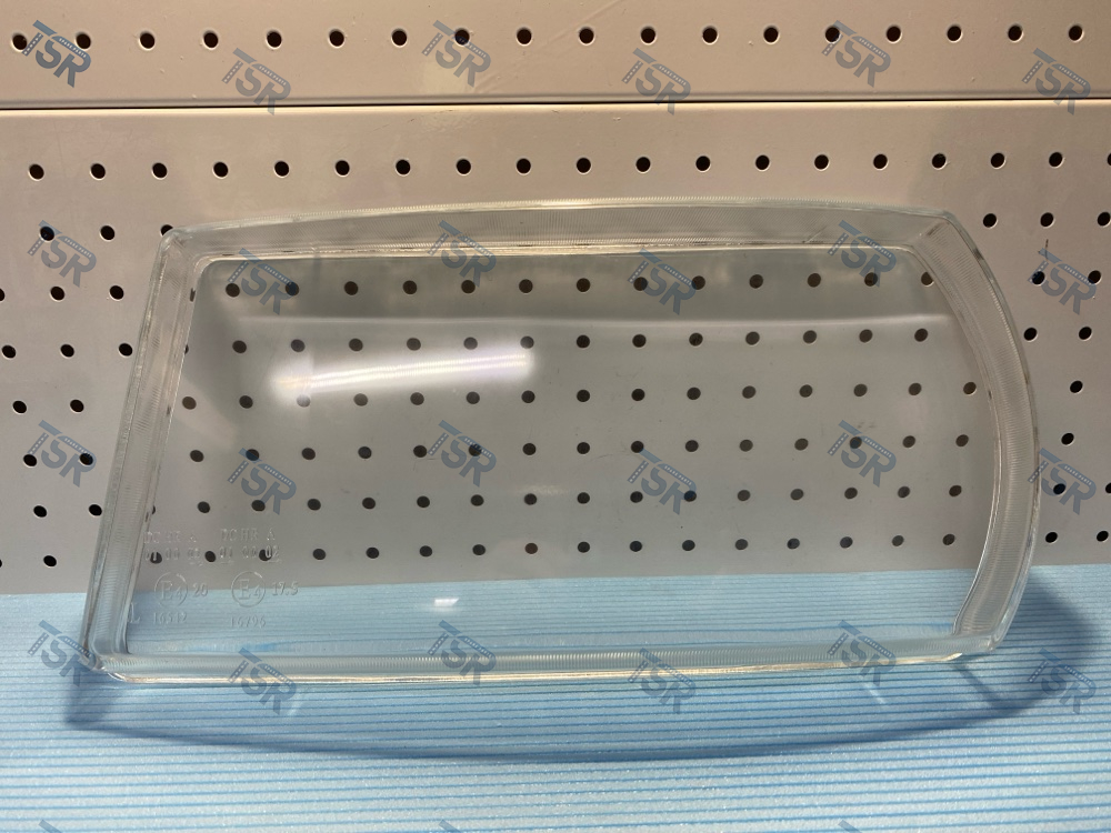 Стекло фары левое