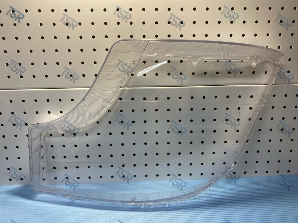 Стекло фары левое