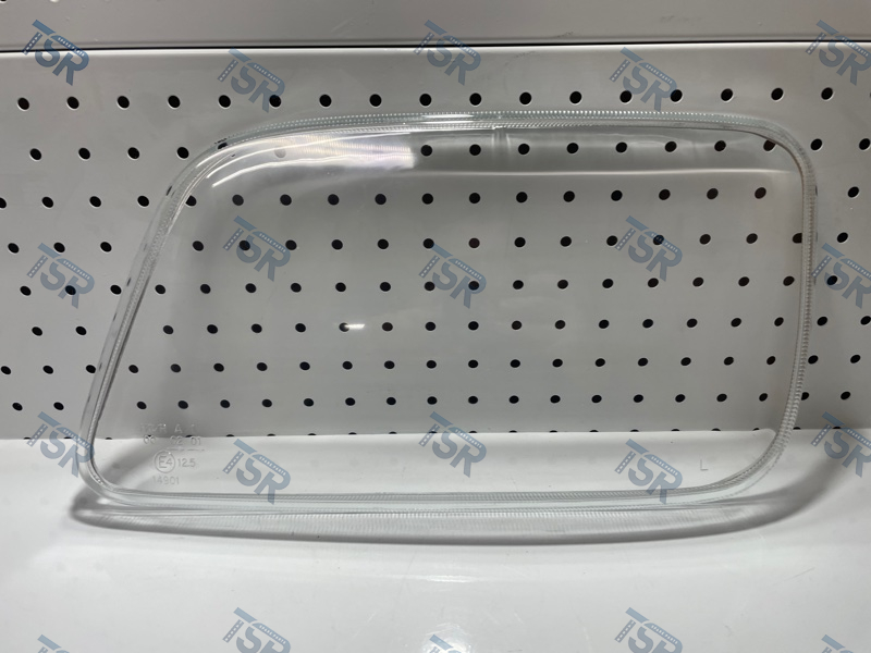 Стекло фары левое