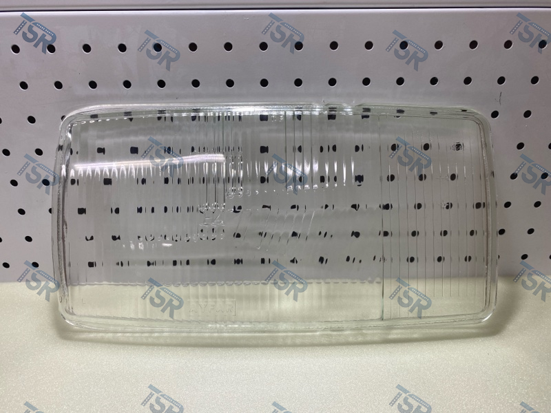 Стекло фары левое